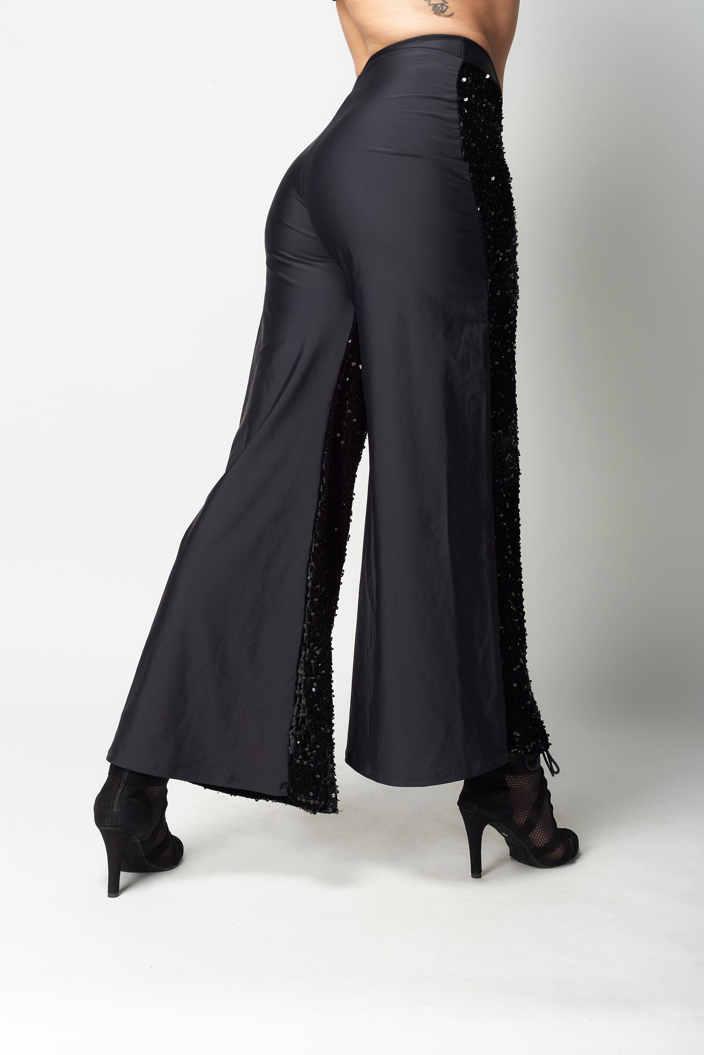 PANTALÓN FLARE DE LENTEJUELAS